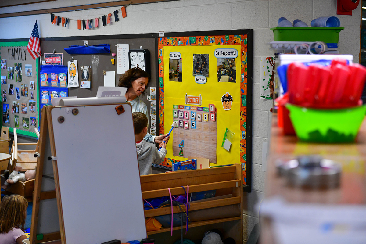 students exploring music and sound with Montessori bells